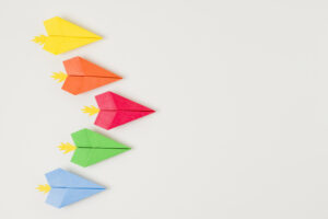 top view colorful paper planes 300x200 - top-view-colorful-paper-planes